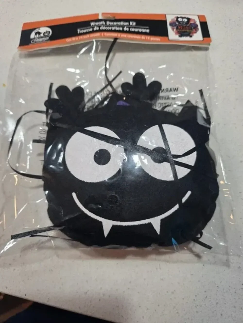 decoration kit, bat design with black fuzzy material and gray felt face